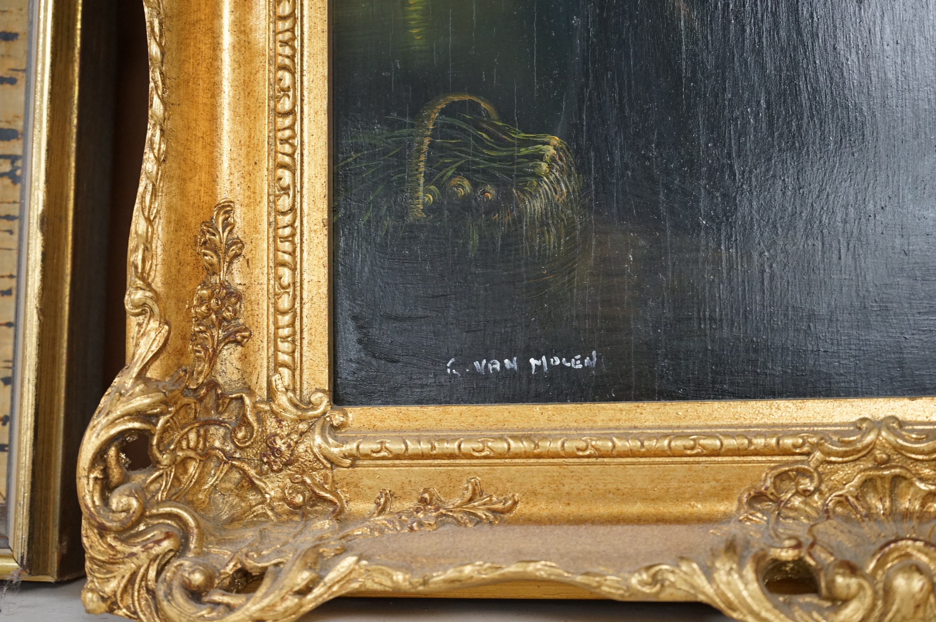 R. van Molen (Dutch, circa 1930's), pair of oils on board, 'Street vendors by candlelight', each signed, 38 x 28cm, ornate gilt frame.